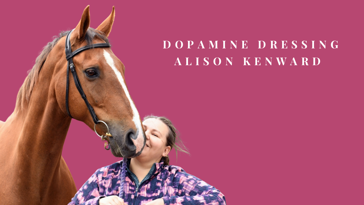 Alison Kenward with a chestnut horse, wearing a colourful pink and purple jacket.