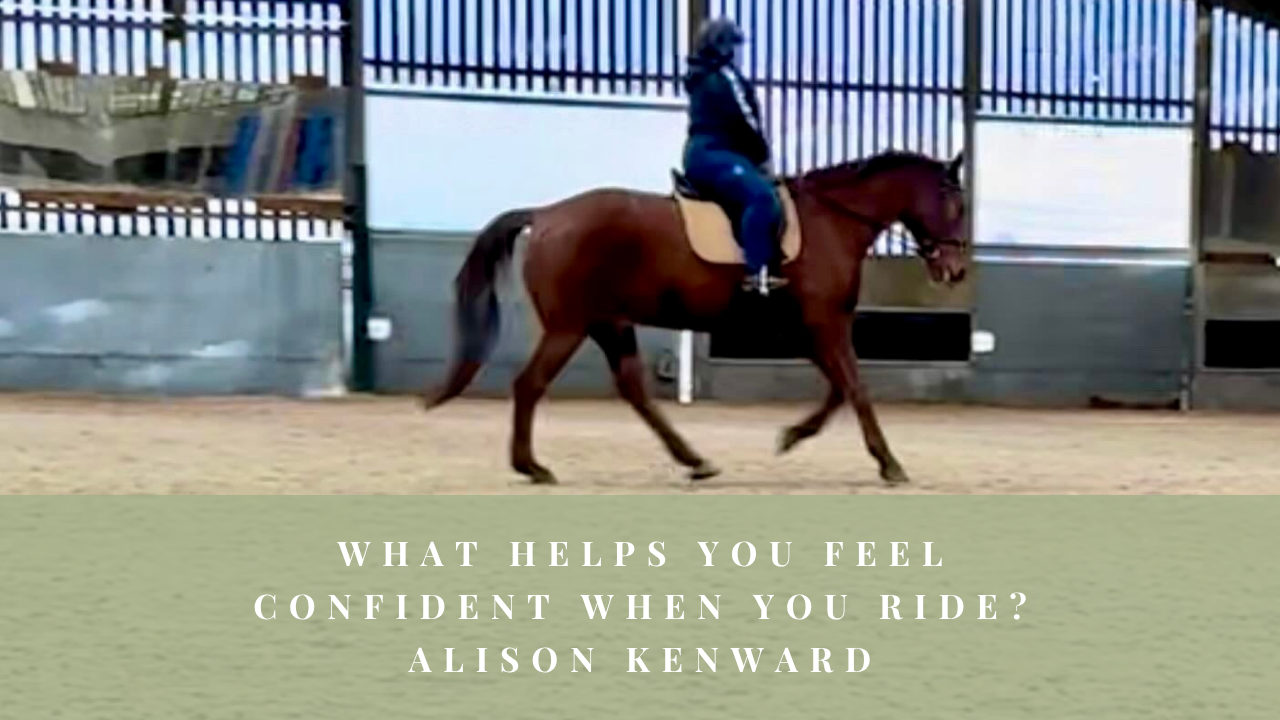 Alison Kenward schooling a horse in an indoor arena.