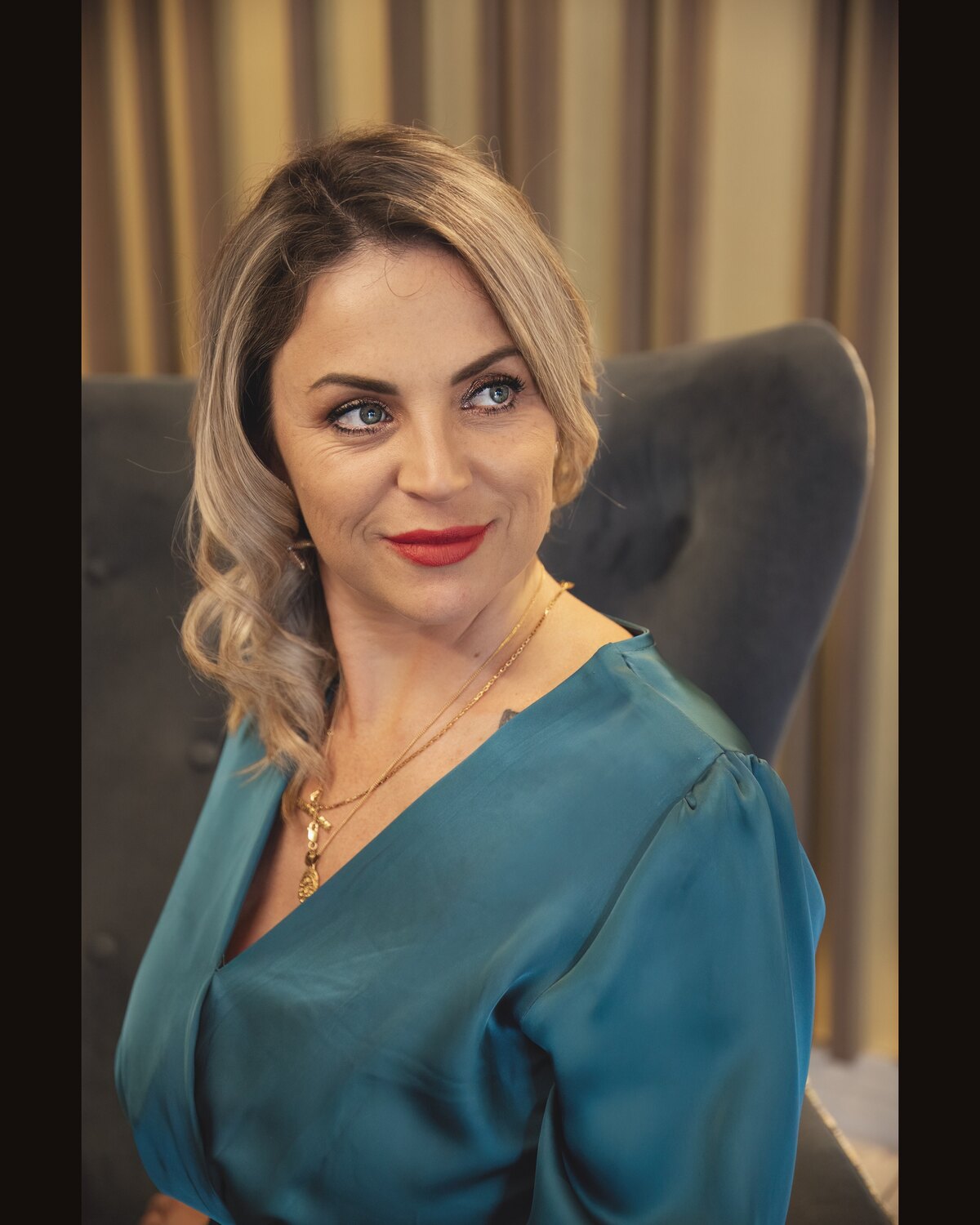 Victoria Bond seated, looking straight at you
