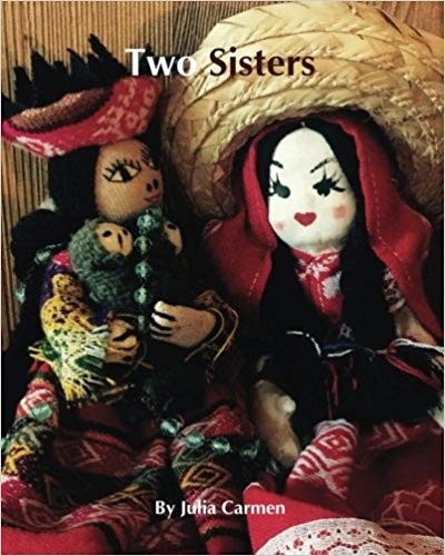 Photograph of 2 girl antique toy dolls.
