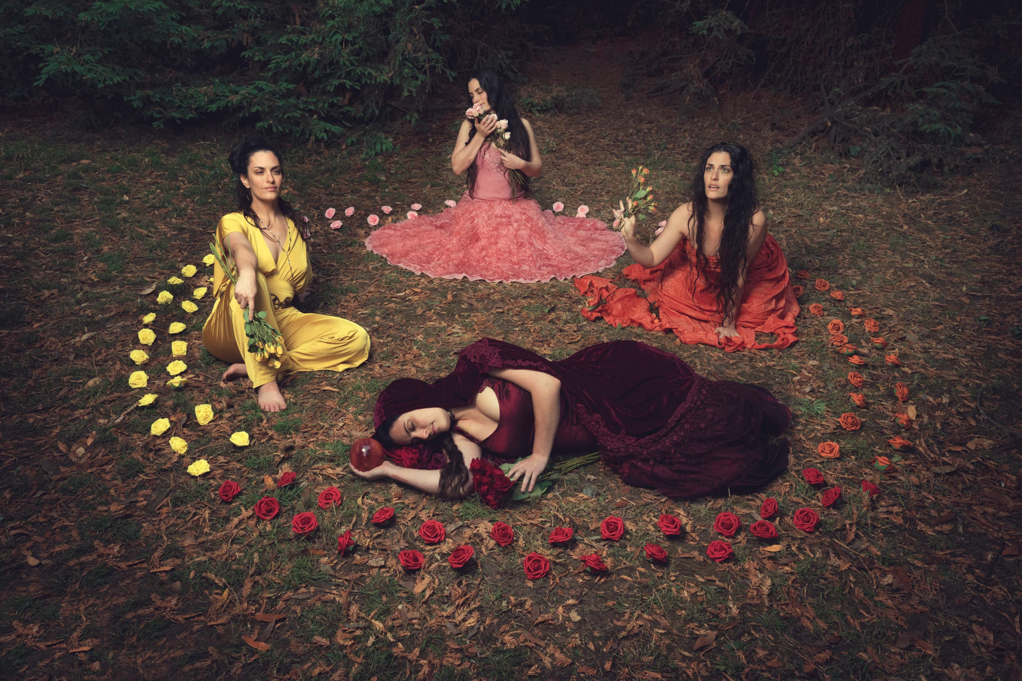 Marya as the four seasons, in yellow, pink, orange, and crimson, encircled by roses