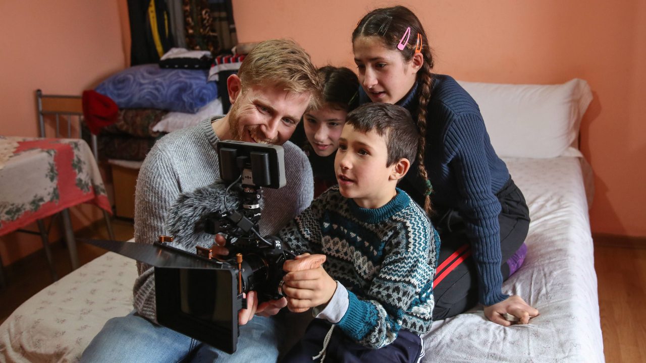 Documentary filmmaker discussing ethical storytelling with interview subject