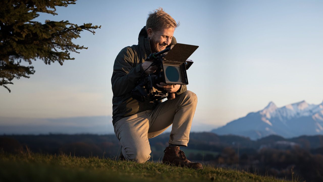 Documentary filmmaker Sebastian Solberg on location filming a documentary