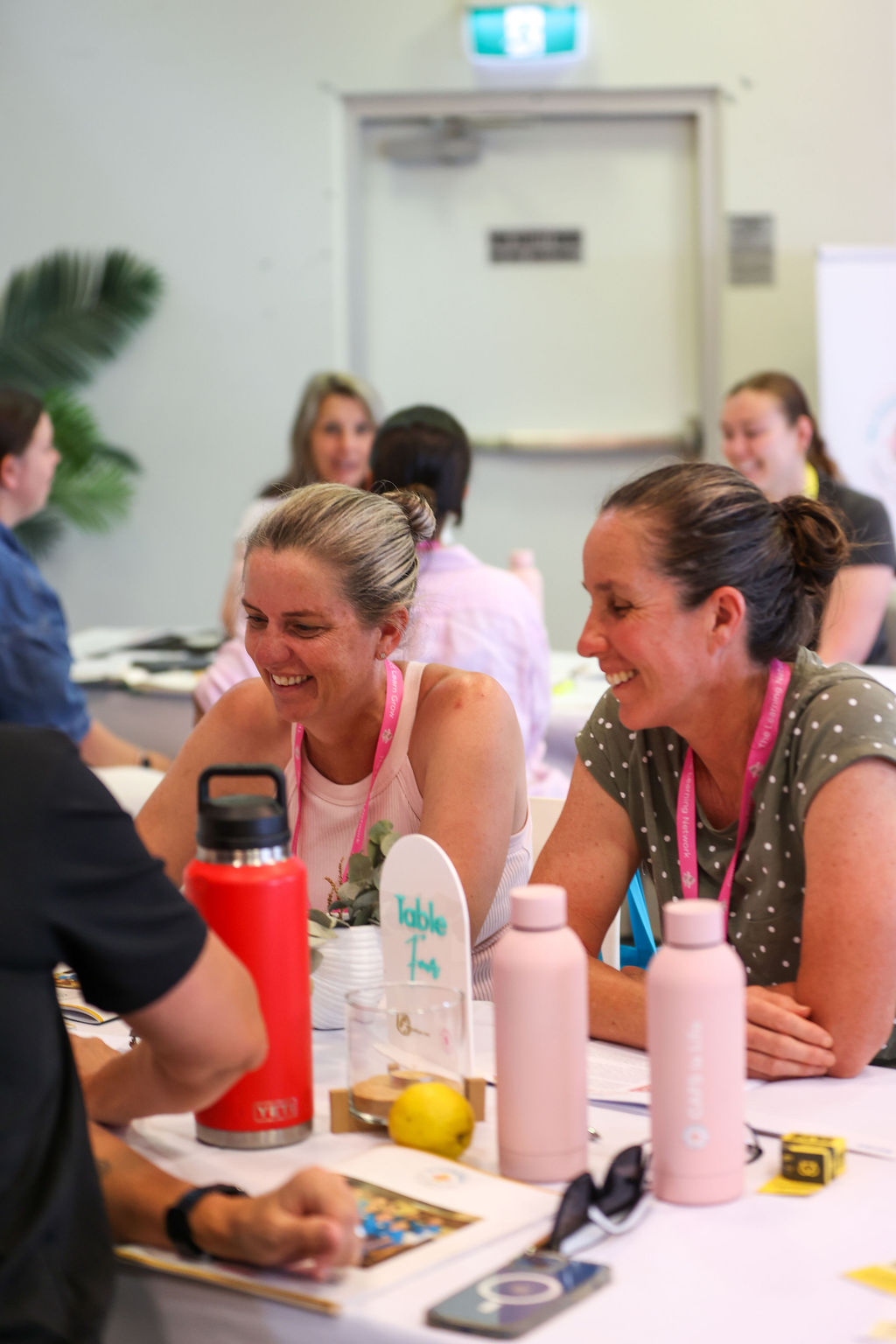 Two teachers sharing ideas at a table