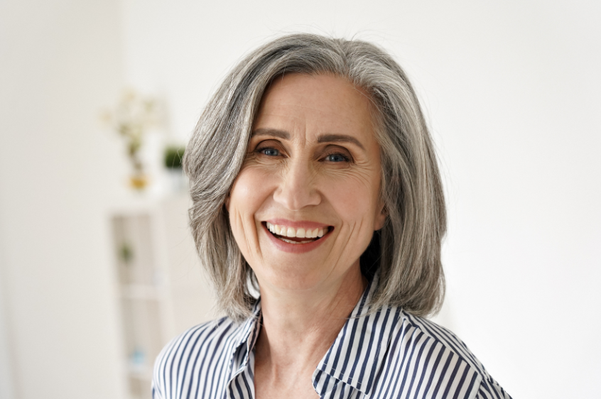 Woman with gray hair smiling