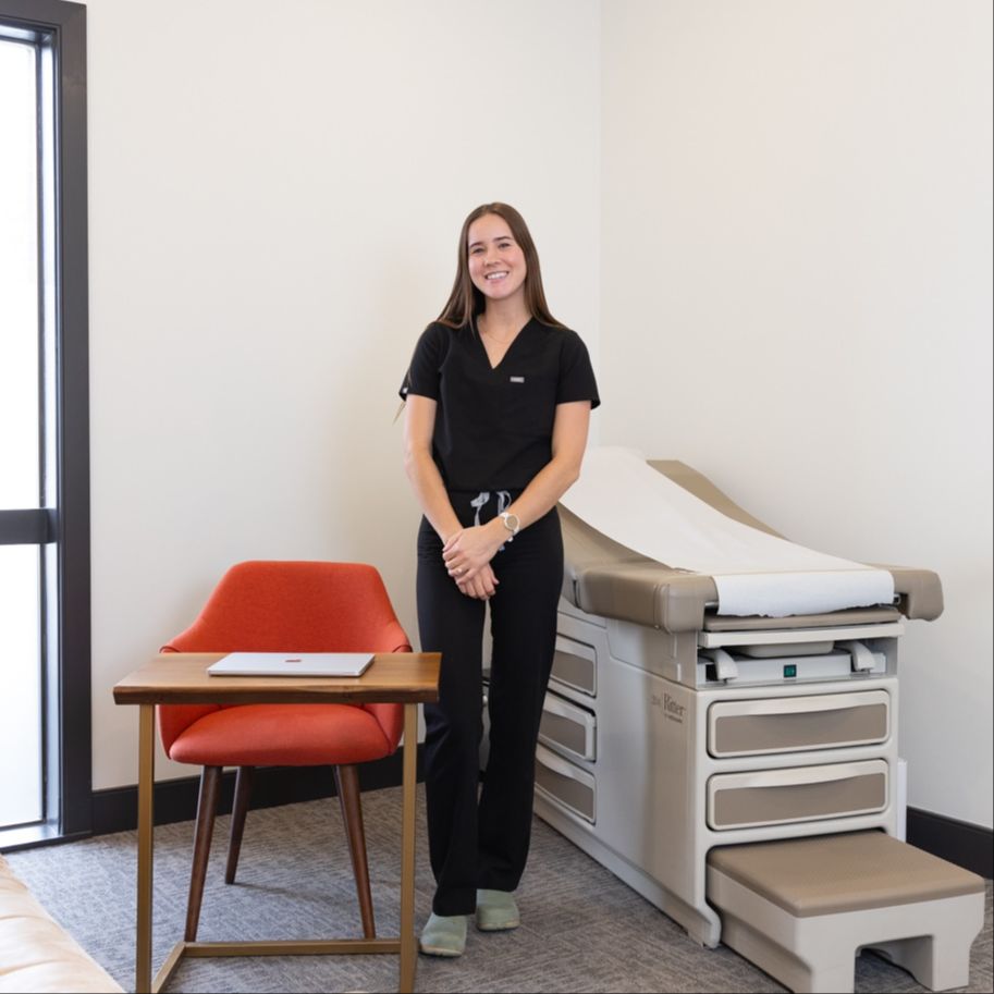 Jennifer Falkner standing in a treatment room
