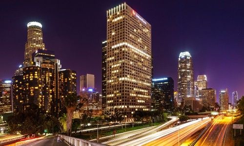 Vibrant Los Angeles Night Skyline with Light Trails