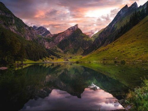 Serene Alpine Lake at Sunset: Captivating Swiss Landscape