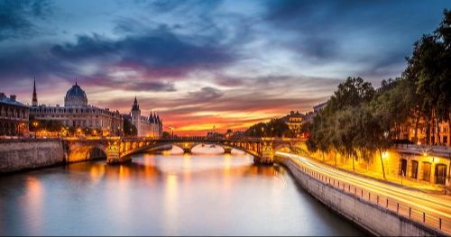 Twilight Serenity Over Paris: Seine River and Historic Landmarks