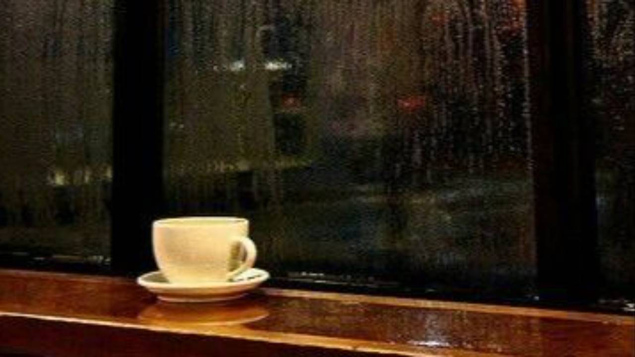 Cold cup of tea on a windowsill, illustrating rest guilt for high achievers who can't relax