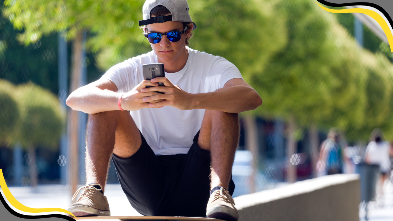 teenager looking at their phone