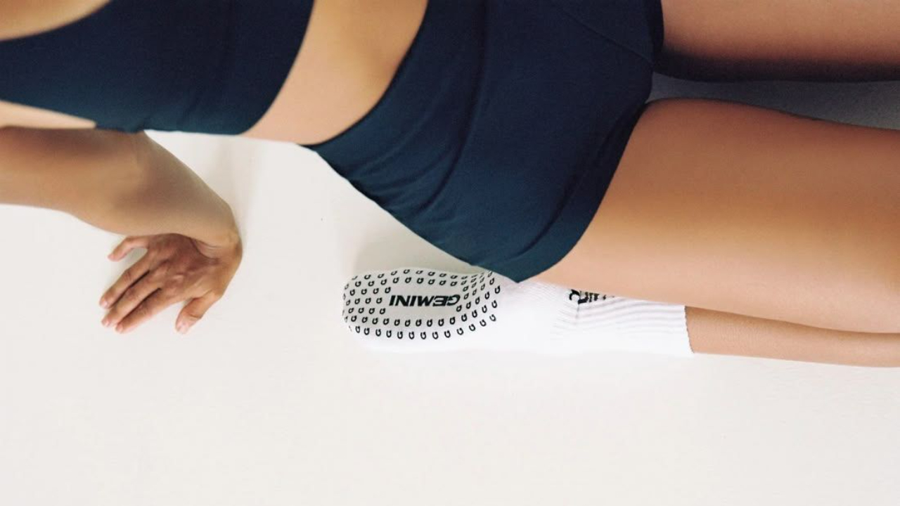 Woman in athletic wear performing a leg-focused exercise, highlighting lower-body strength training and muscle toning for women without running.