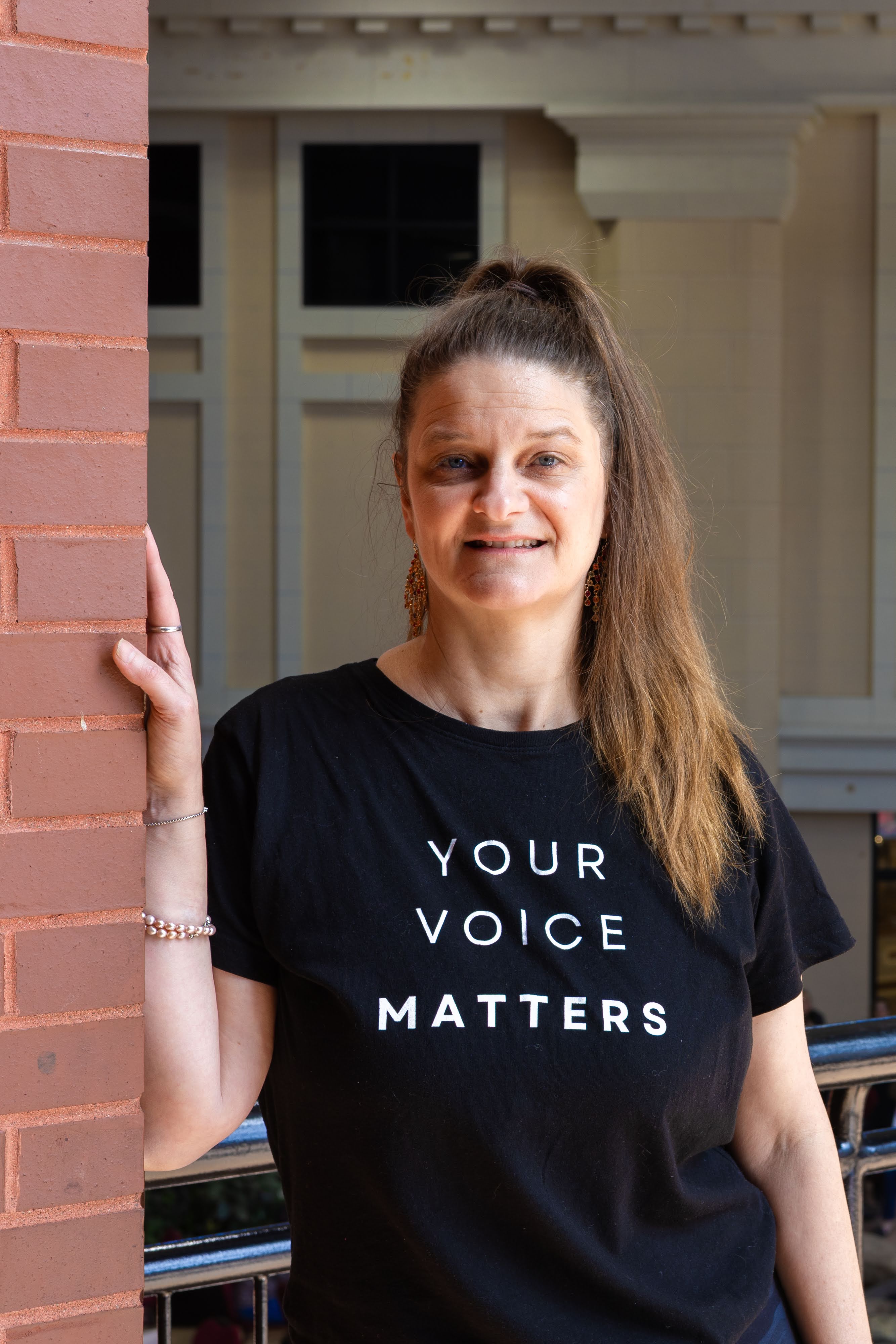 Angélique Binet wearing a Your Voice Matters t-shirt