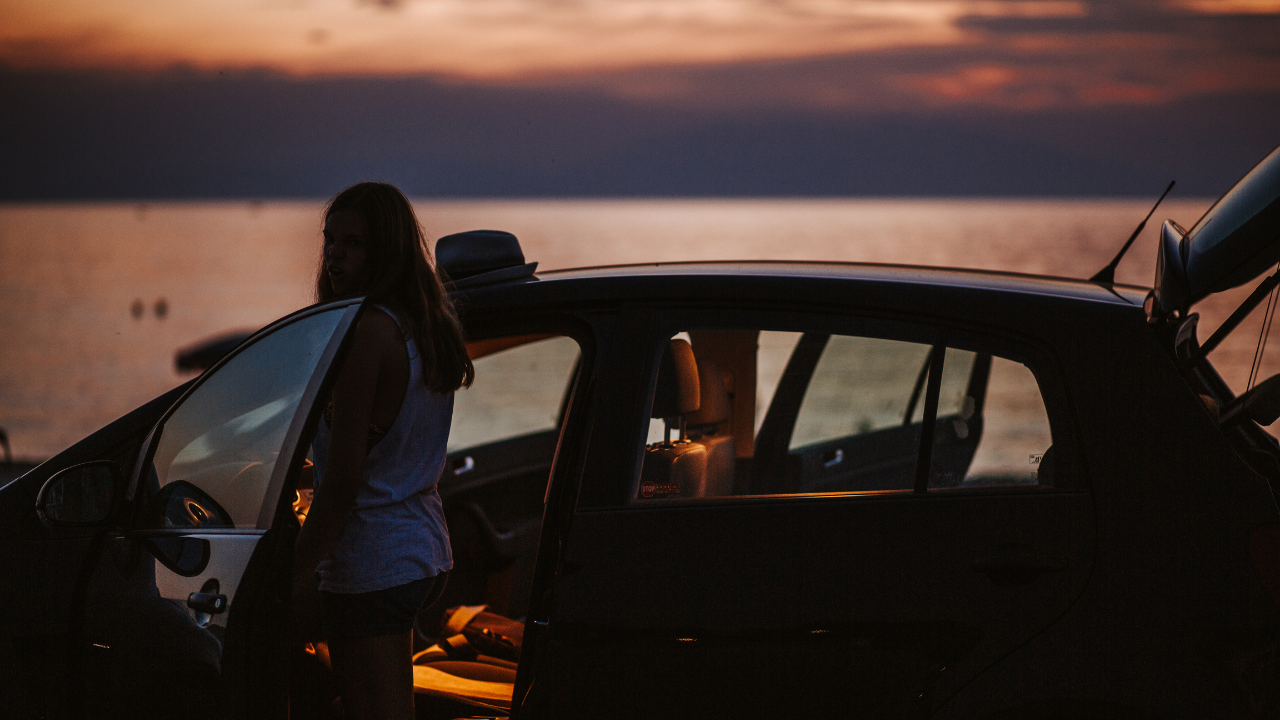 woman getting into the car