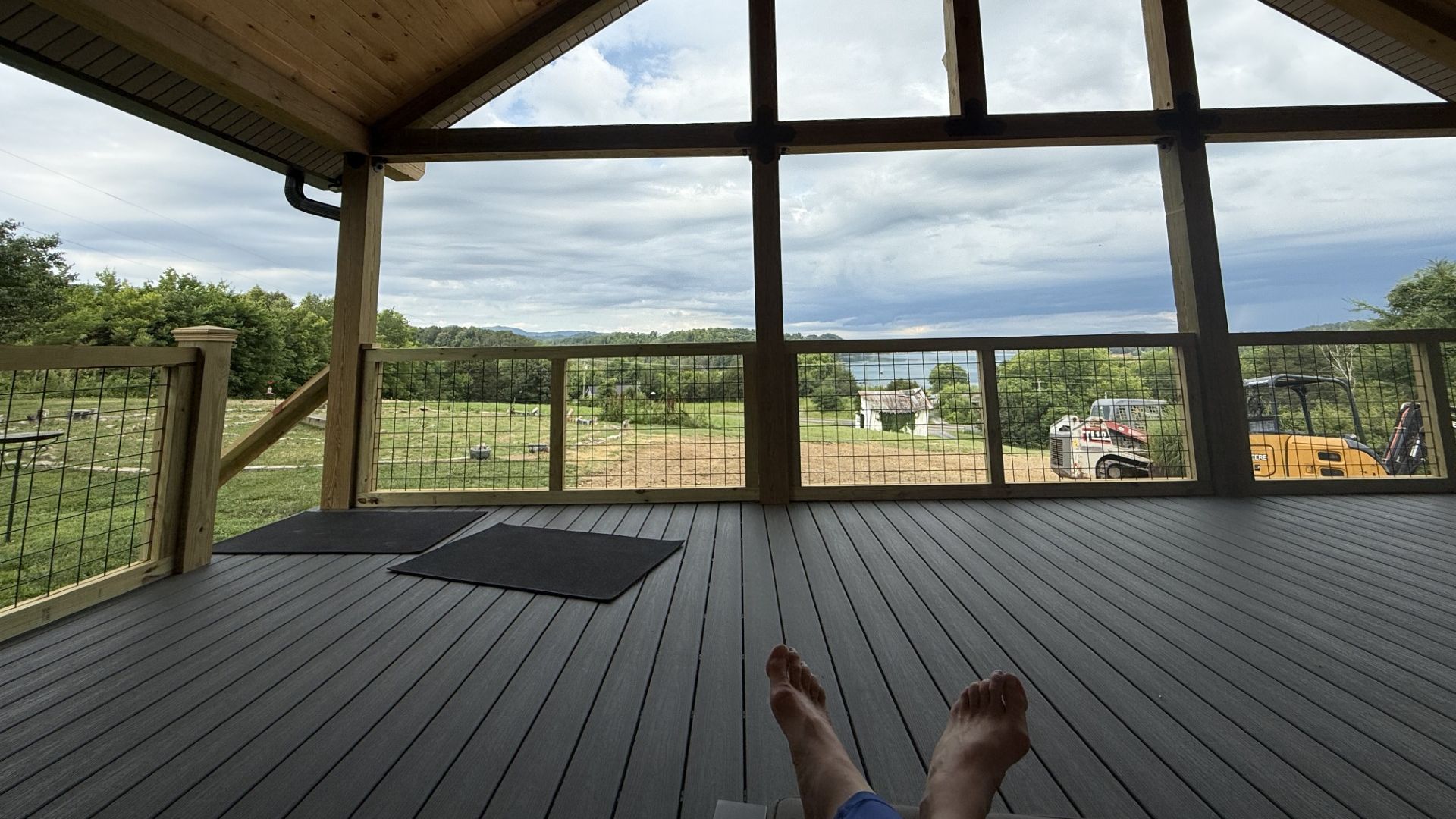 Jill resting on her covered porch