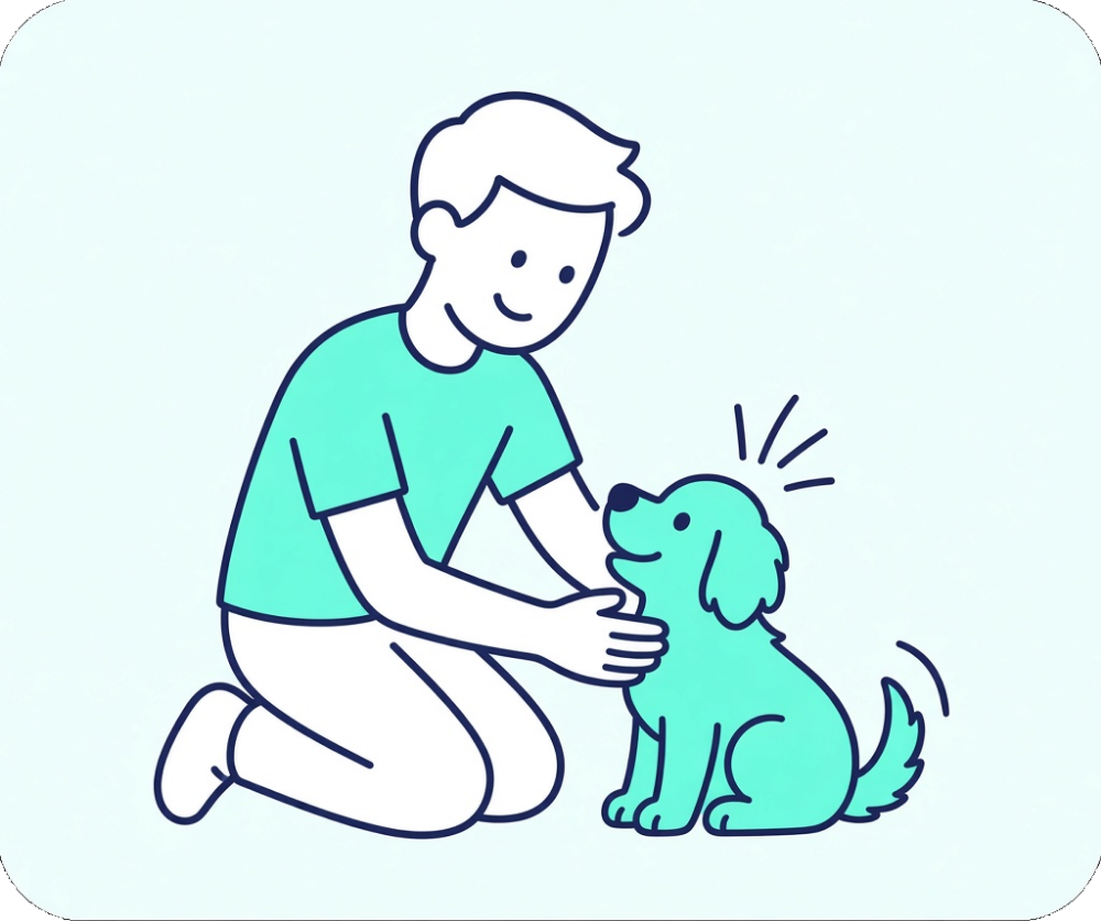 An owner kneeling to stroke a happy puppy