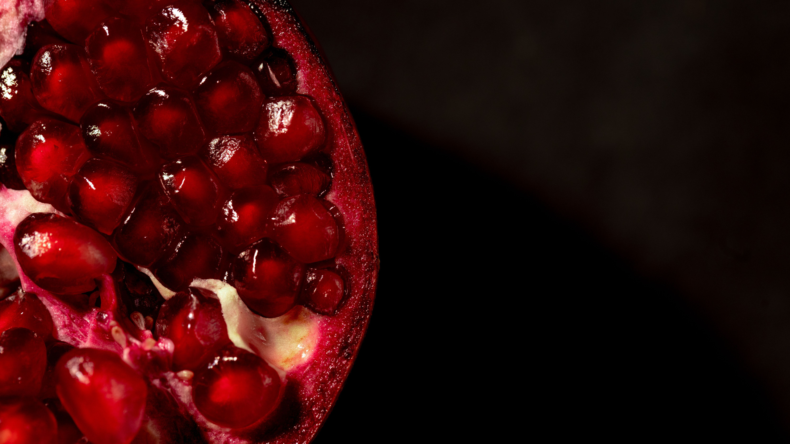 Pomegranate seeds in the dark