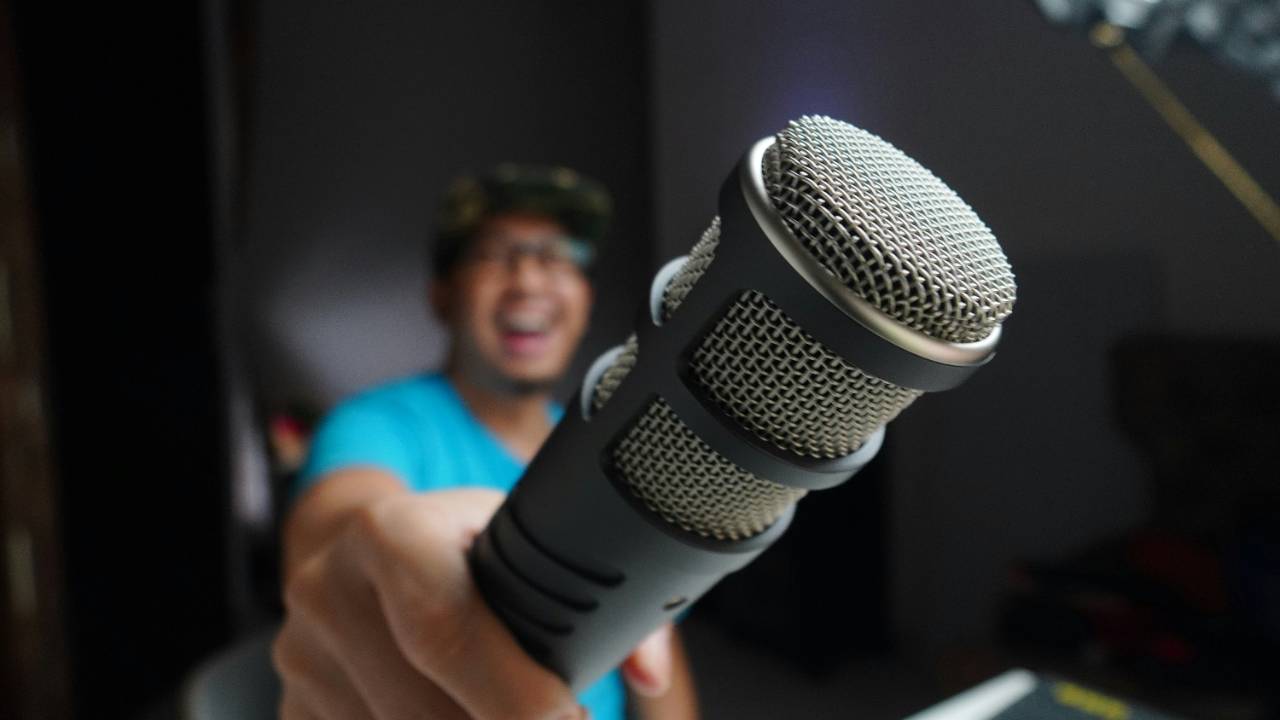 Man with microphone waiting for a message