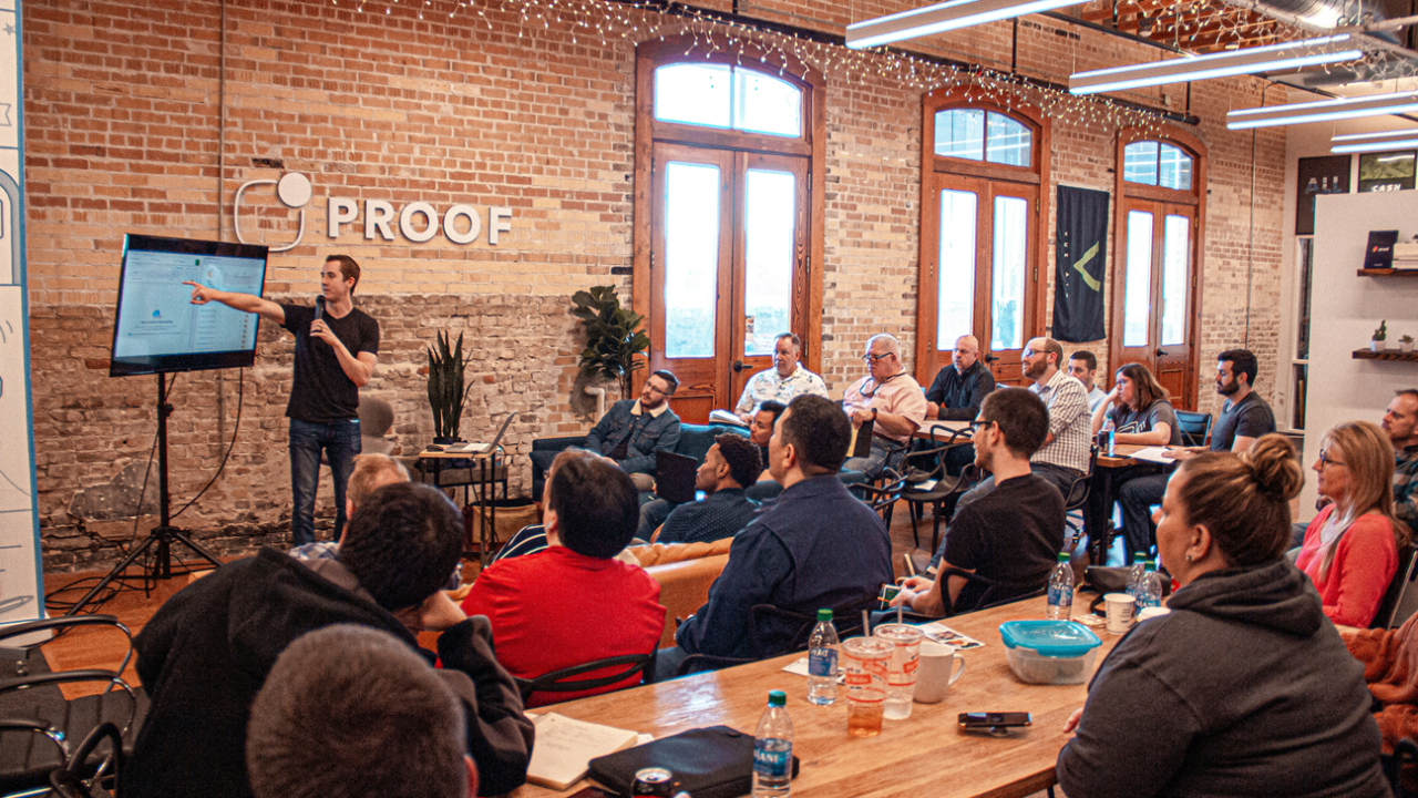 Person successfully presenting to a room full of people without presentation anxiety