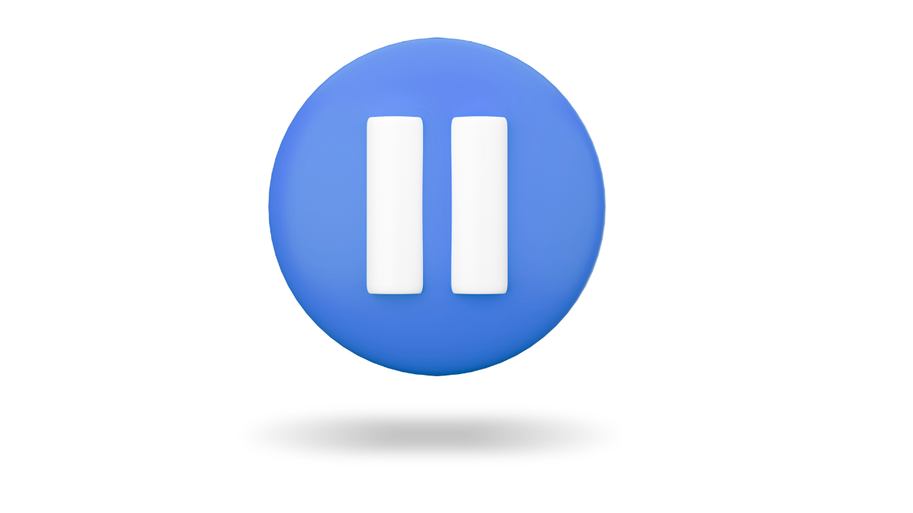 A soft blue three-dimensional pause button against a white background, representing the Inner Empire™ truth that pressing pause is not falling behind but the most strategic move a woman in midlife can make.