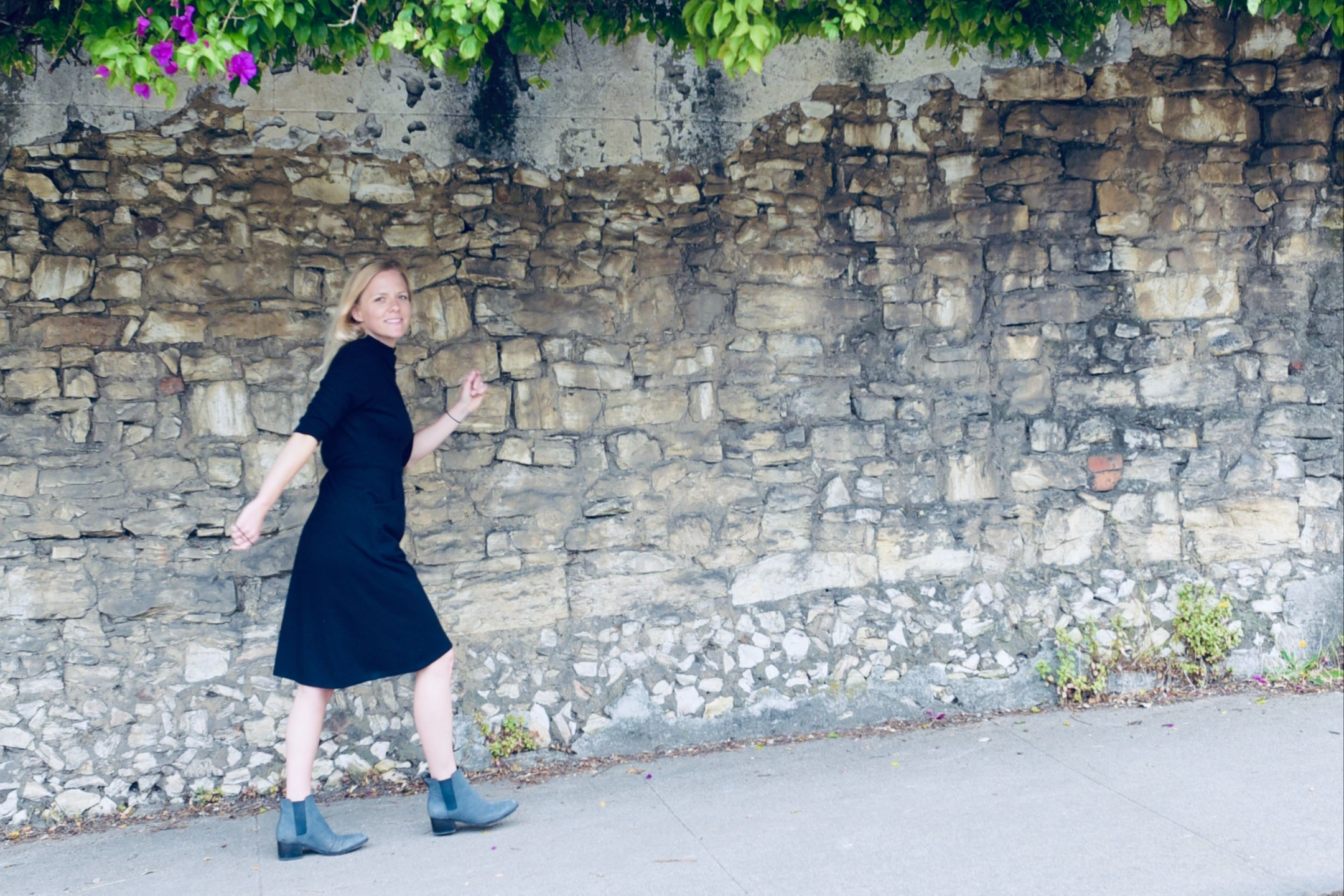 Katie Lain walking outdoors during her recovery journey.