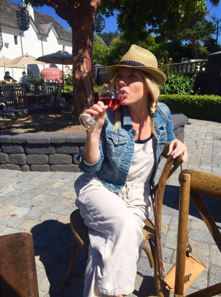 Katie Lain seated outdoors during a key moment in her recovery journey.