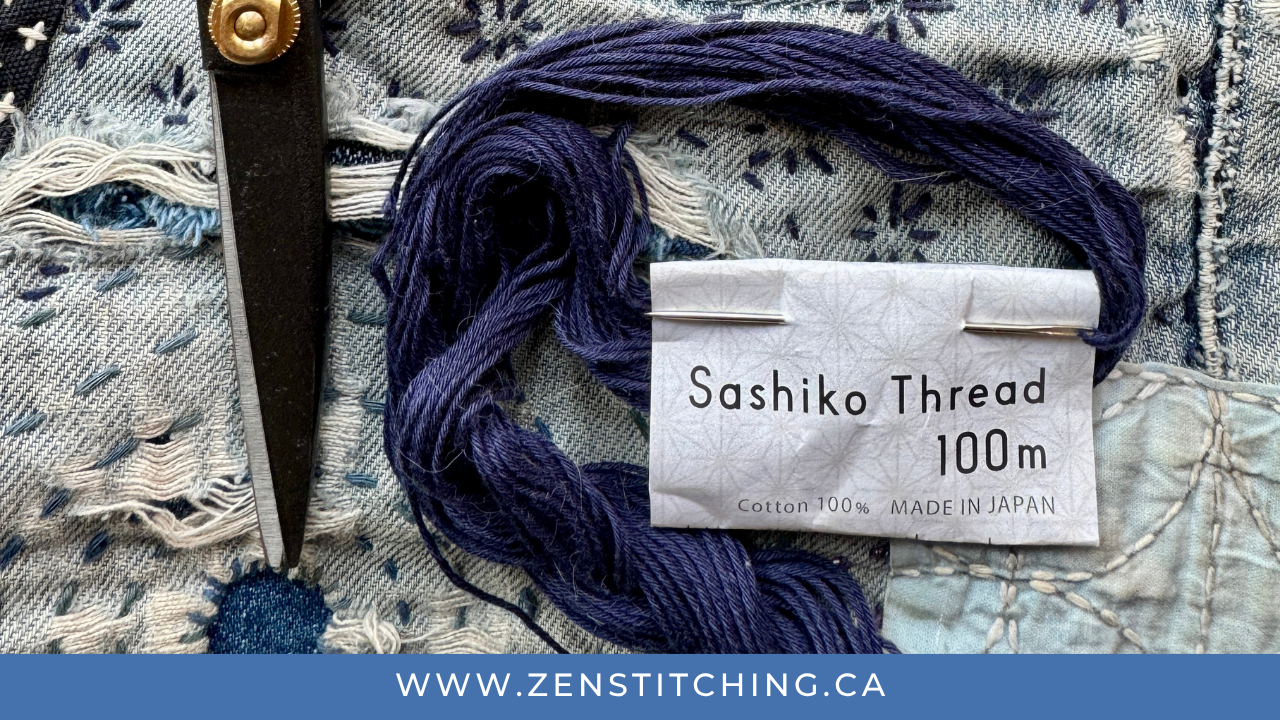 a coiled plait of Sashiko thread sits on top of a piece of denim mended with Sashiko stitches. A bar at the bottom reads "www.zenstitching.ca"