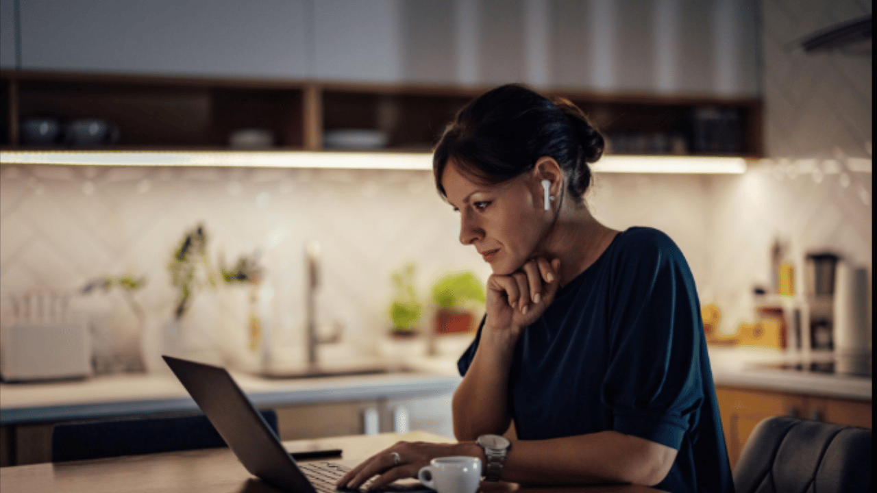 Woman working late at home