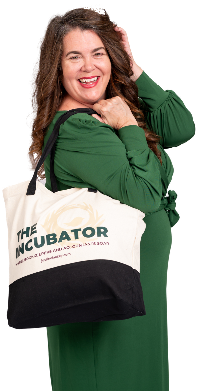Justine Lackey laughing, with The Incubator tote bag over her shoulder