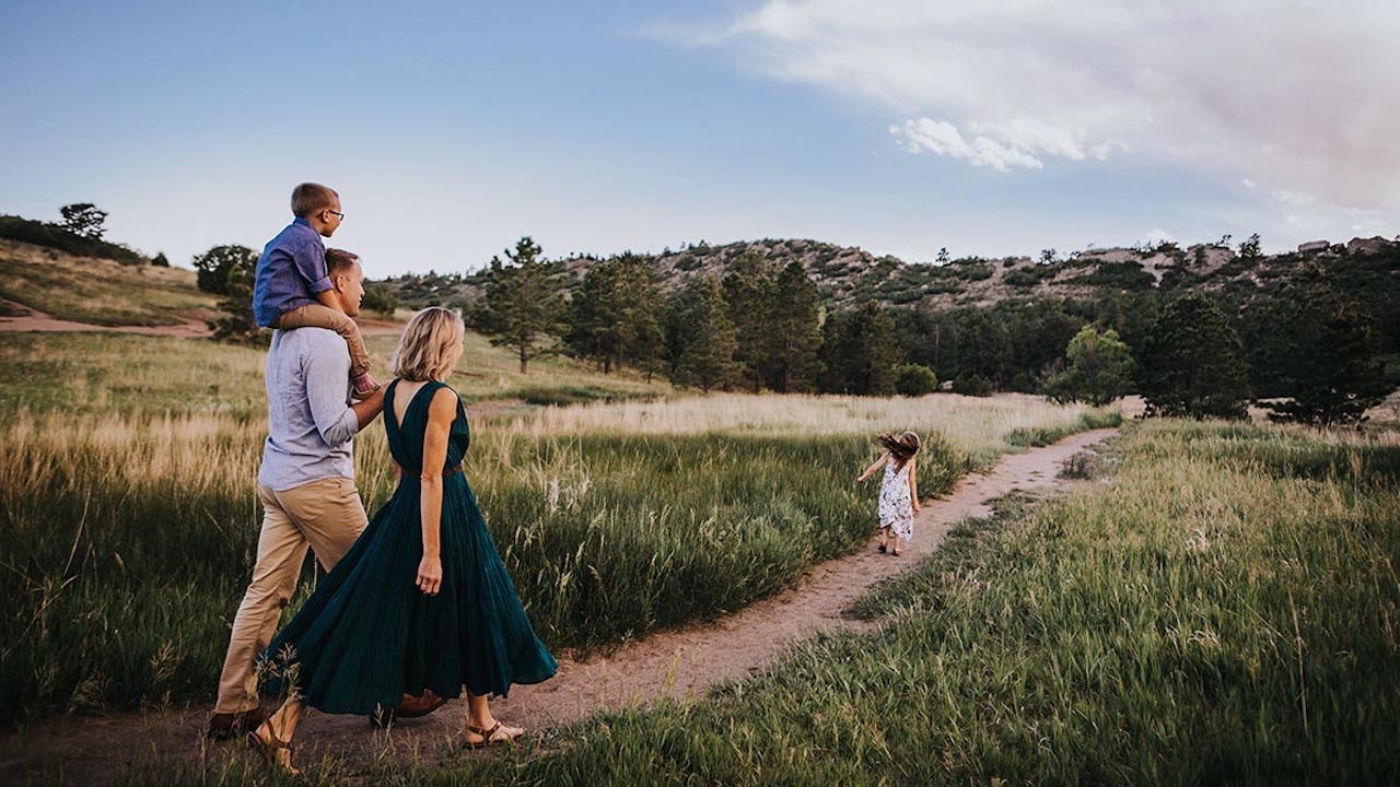 Active family enjoying healthy summer habits including walking and outdoor recreation