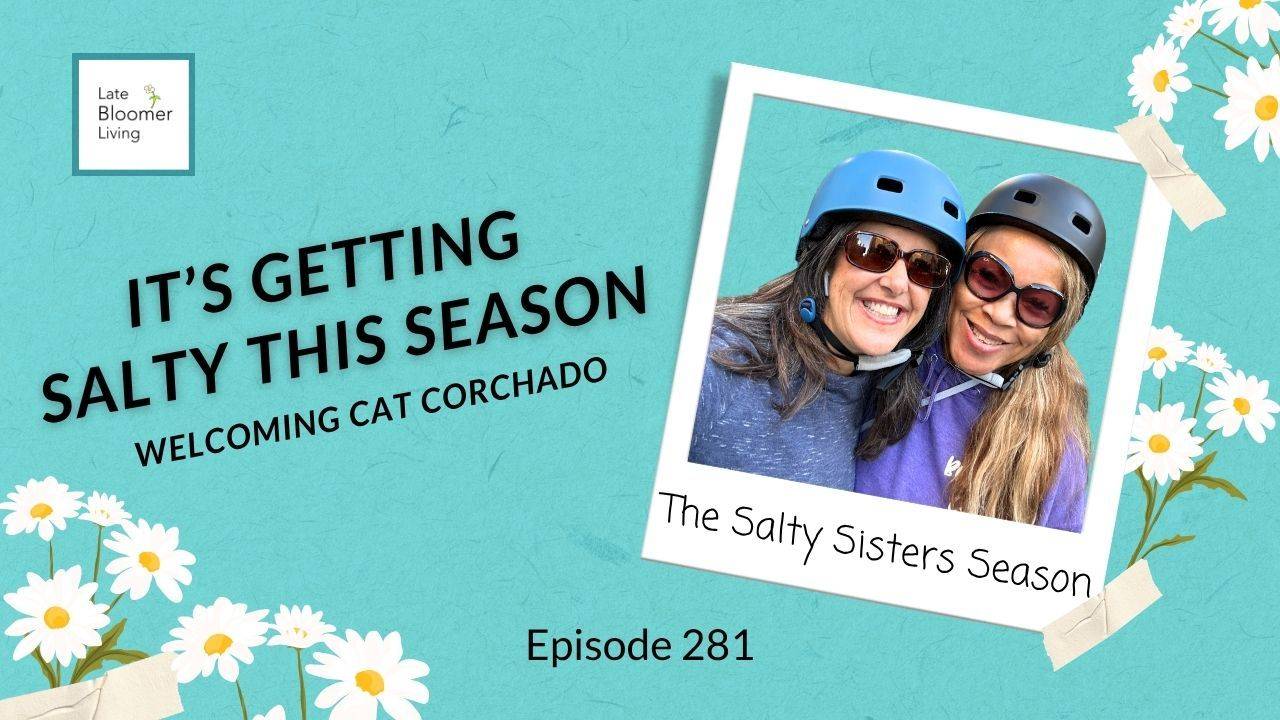 Yvonne Marchese and Cat Corchado smiling together in bike helmets and sunglasses, framed as a taped-up Polaroid captioned "The Salty Sisters Season." Text reads: It's Getting Salty This Season, Welcoming Cat Corchado. Episode 281.