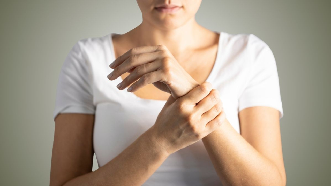 Young woman with wrist pain