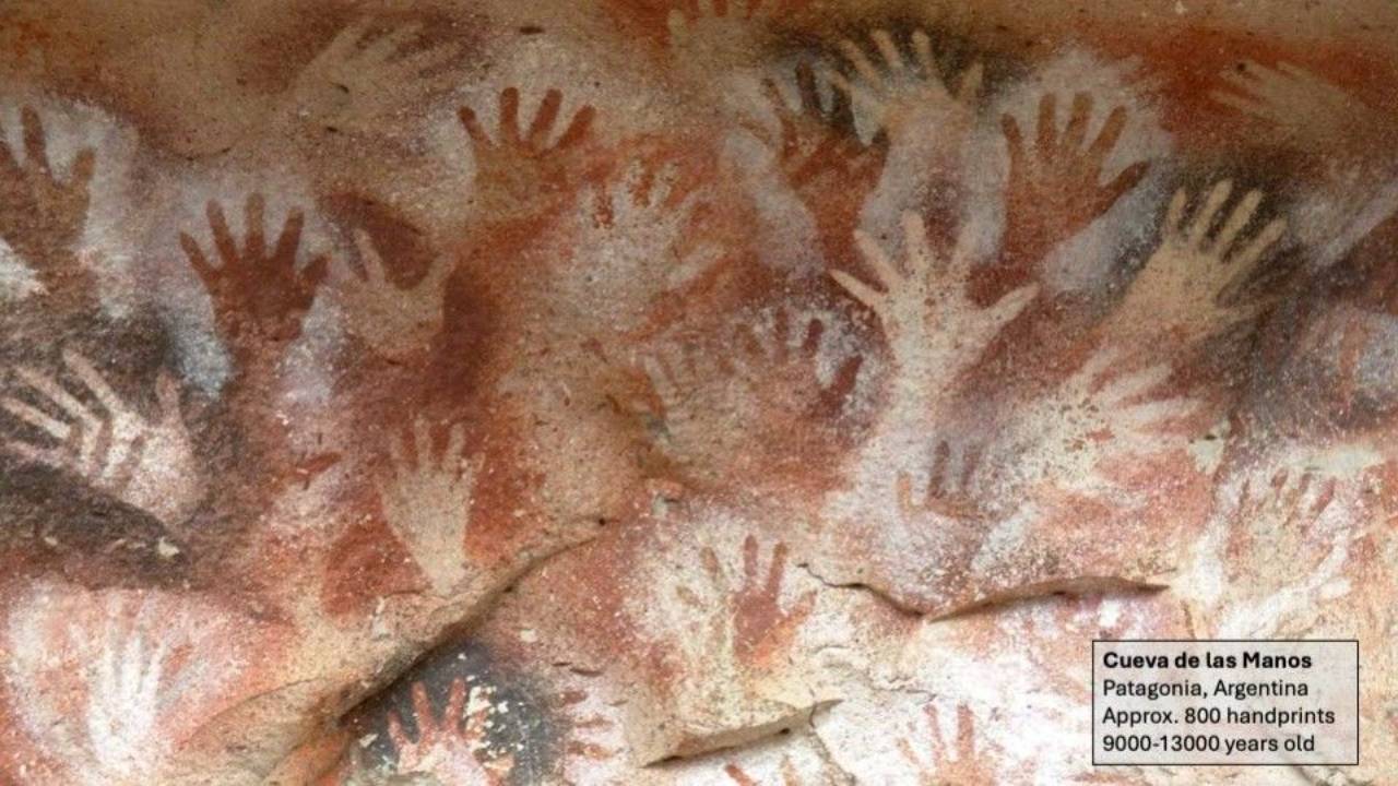 Ancient handprints in red, white and black pigments cover the rock walls of Cueva de las Manos in Patagonia, Argentina. The handprints date back approximately 9,000–13,000 years.