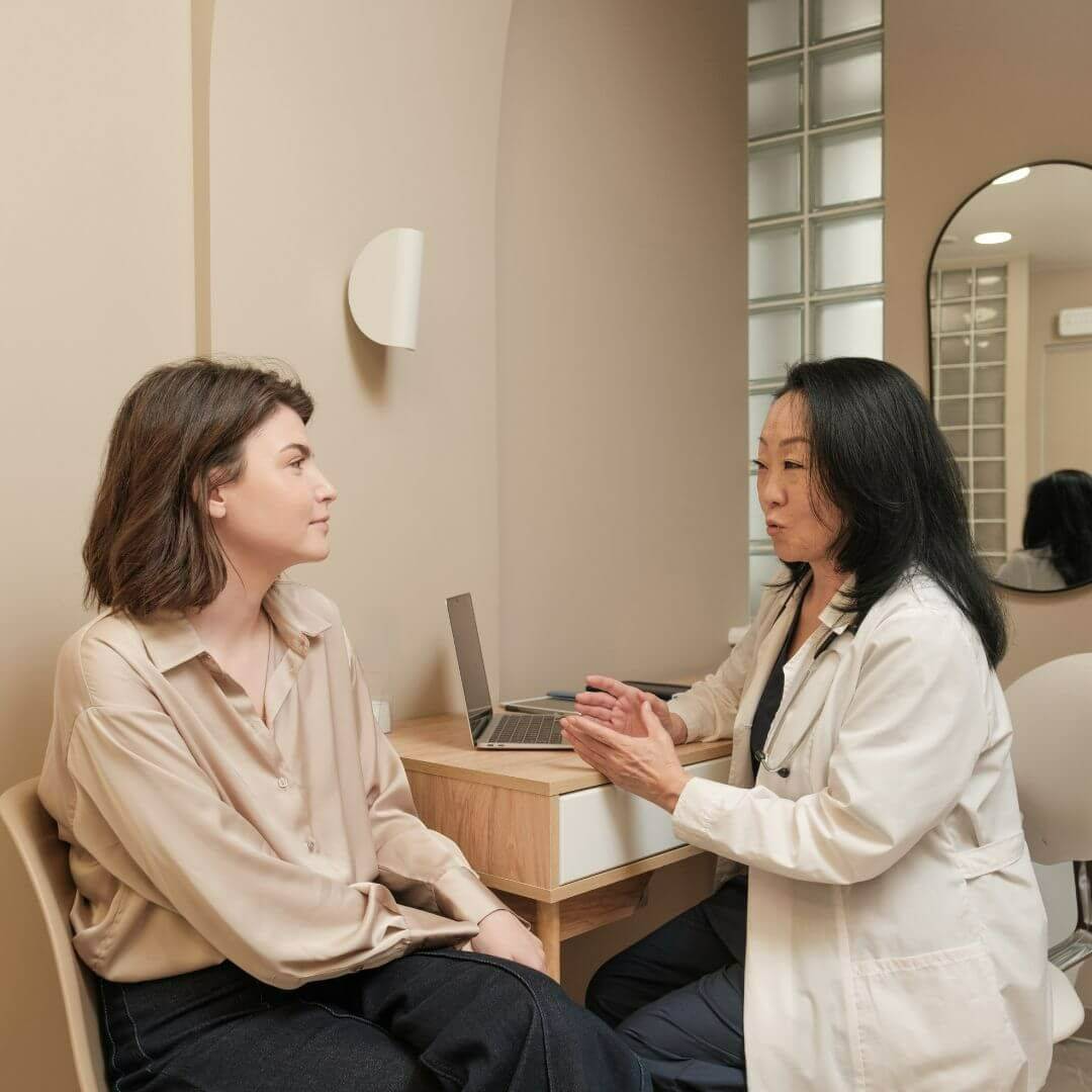 woman using the FND toolkit by re+active pt with her clinician