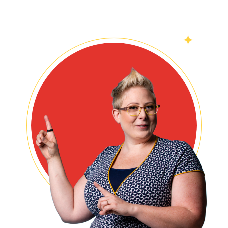 Jacquie Edwards smiling and pointing
