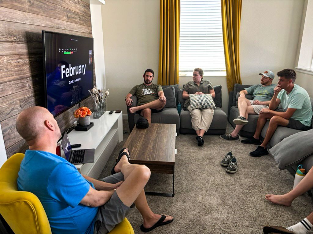 A group of NextGen pastors having a discussion about their 6 month experience.