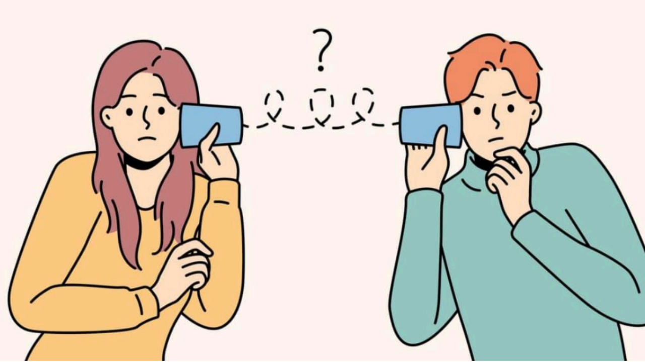 Couple holding cans to ears with coil between, symbolizing communication problems. Couples therapy in Michigan with a couples therapist can help!