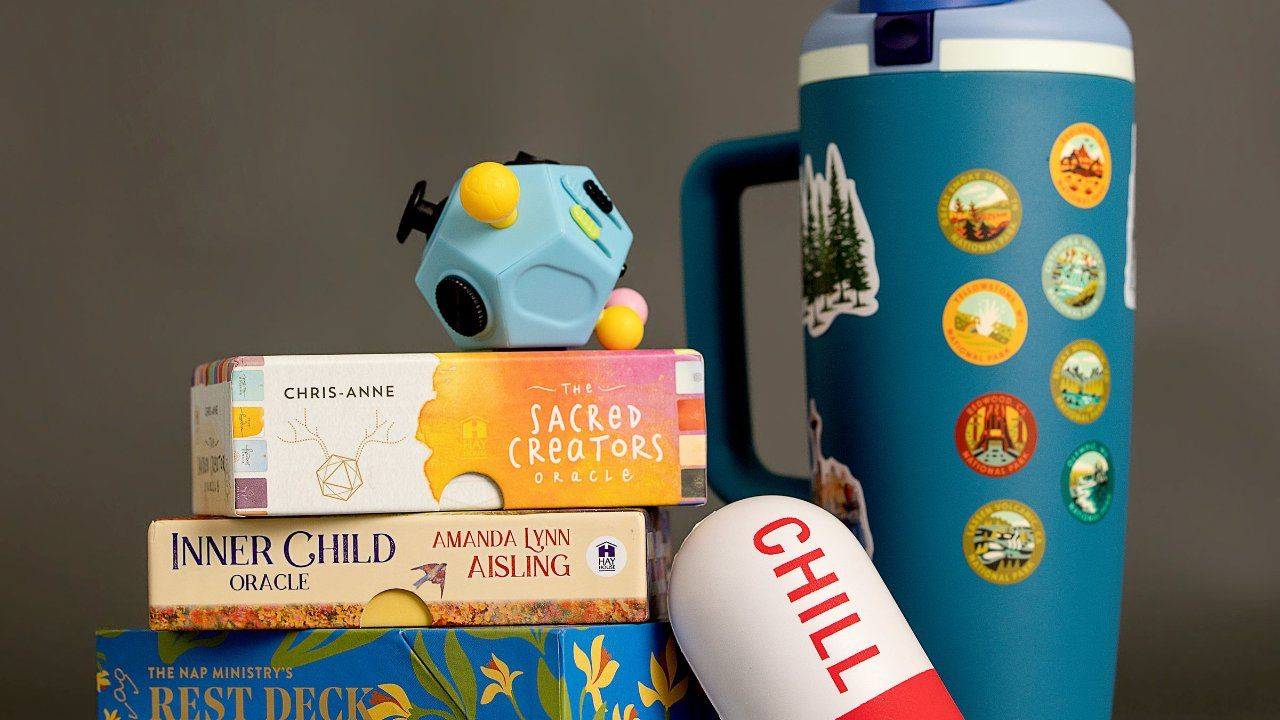 Books for autistic adults with a fidget toy and chill pill, autistic burnout recovery, Plymouth, Michigan therapist