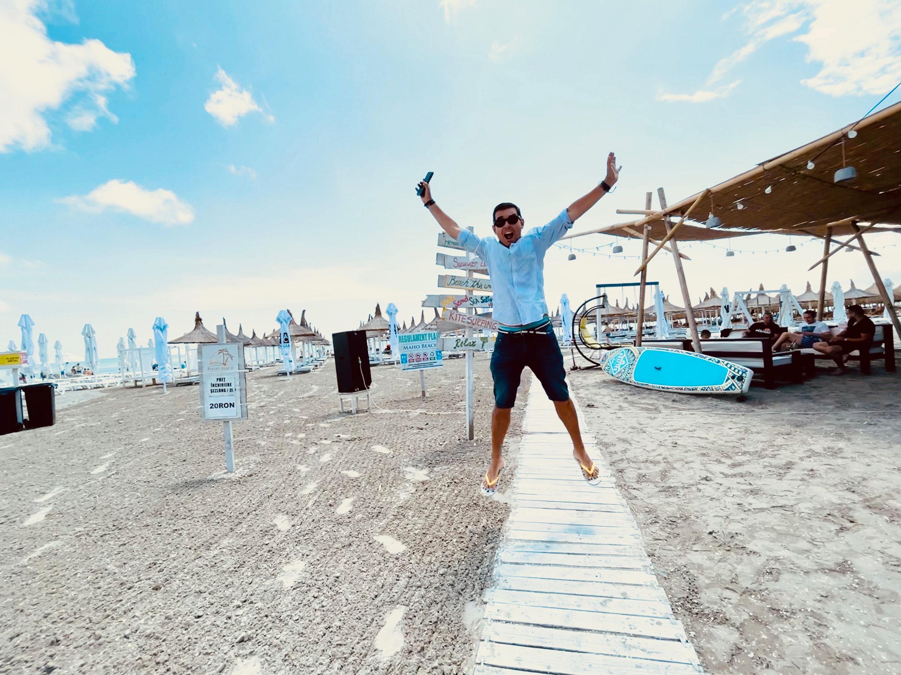 Jose Nadela celebrating progress and possibility by the sea