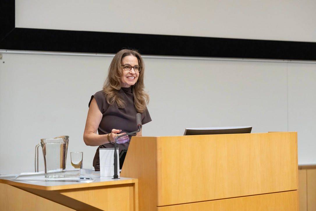 Dr. Melinda Ring speaking on stage