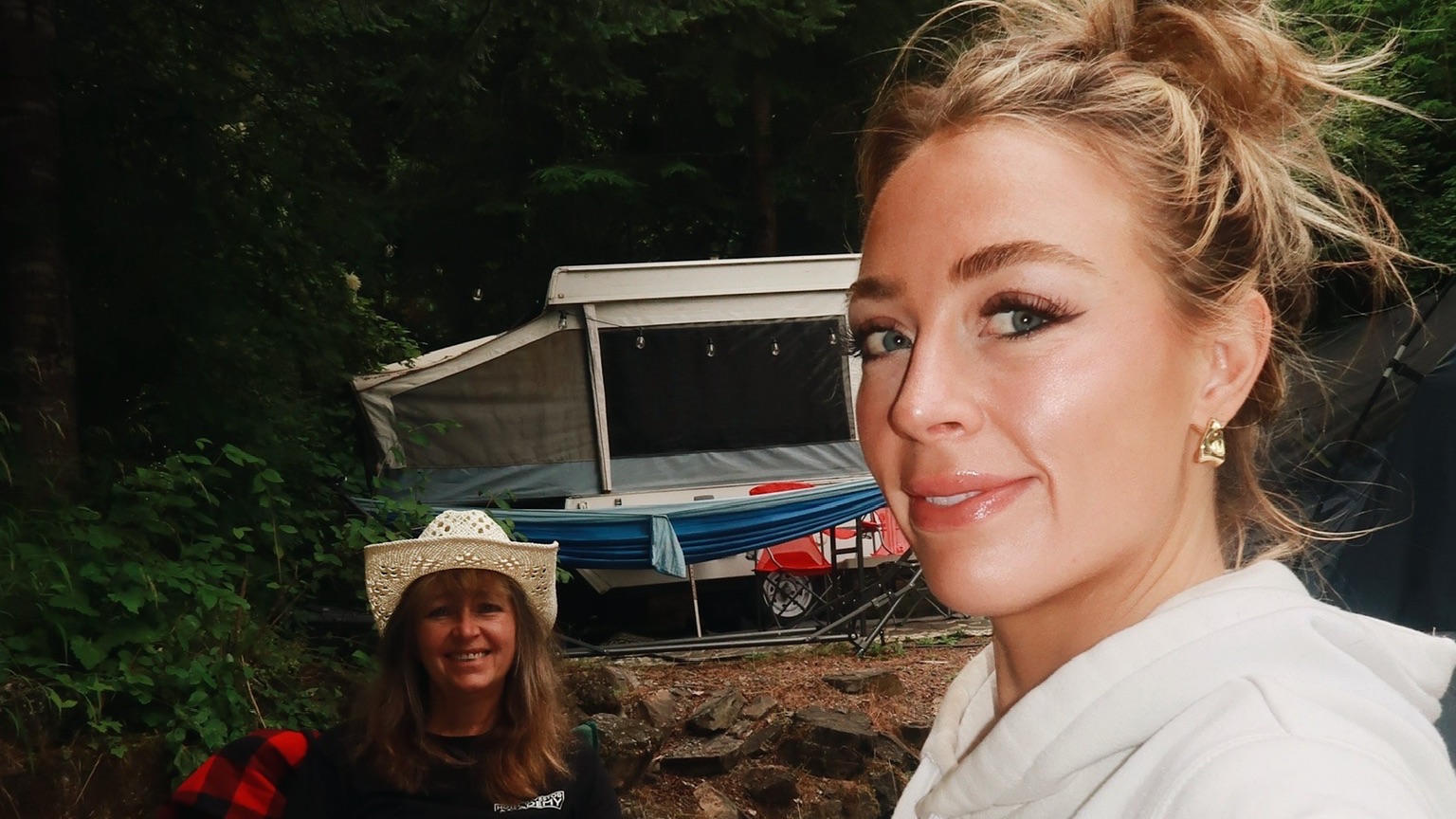 Brittany Arnason with her mother at a campsite.