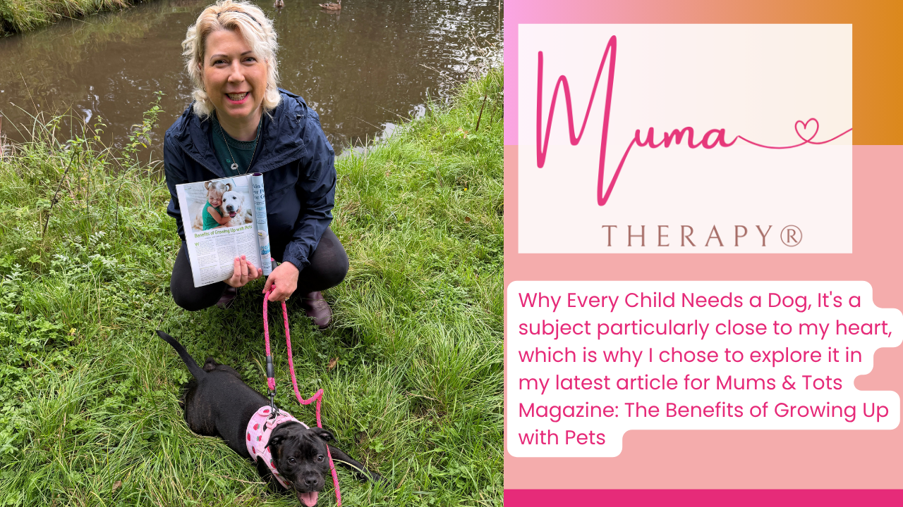 Emma Grant Author holding mums and tots magazine with a staffordshire bull terrier puppy on a lead in front of a duck pond with ducks 