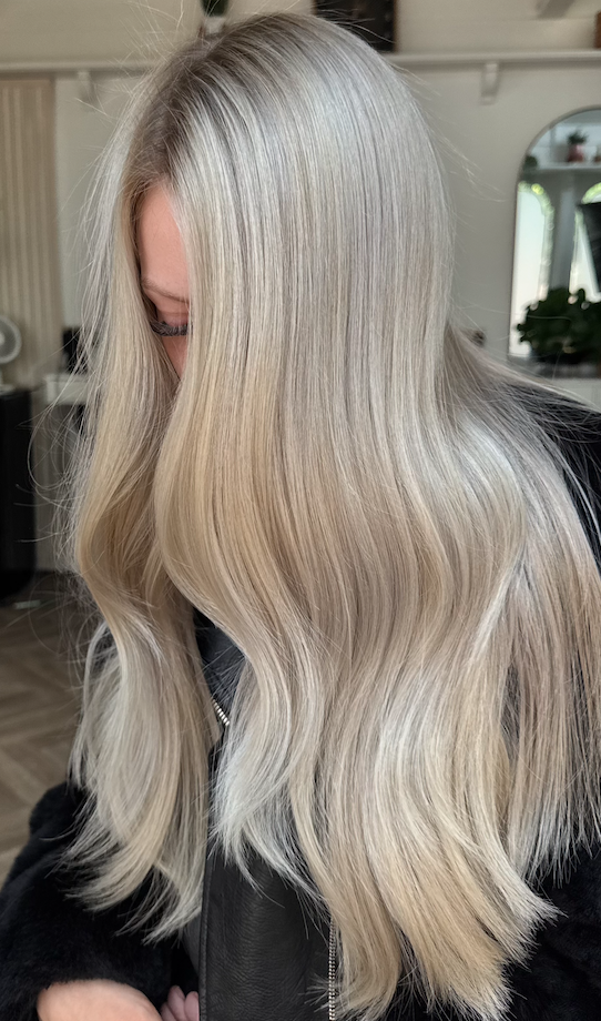 Dimensional blonde hair close-up with a soft seamless finish