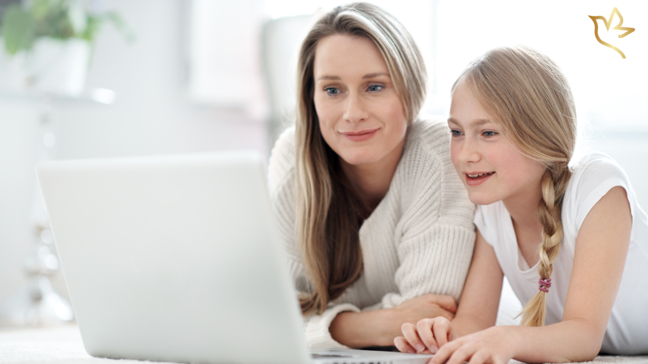 Mother and daughter creating an online funeral fundraiser together on a laptop to help with funeral and memorial expenses.