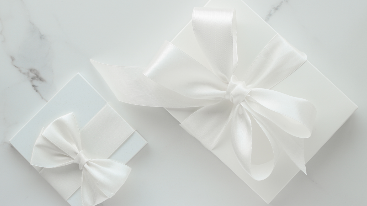 Thoughtful sympathy gifts boxes representing flowers, memorial keepsakes, comfort baskets, and meaningful remembrance gifts for grieving families.