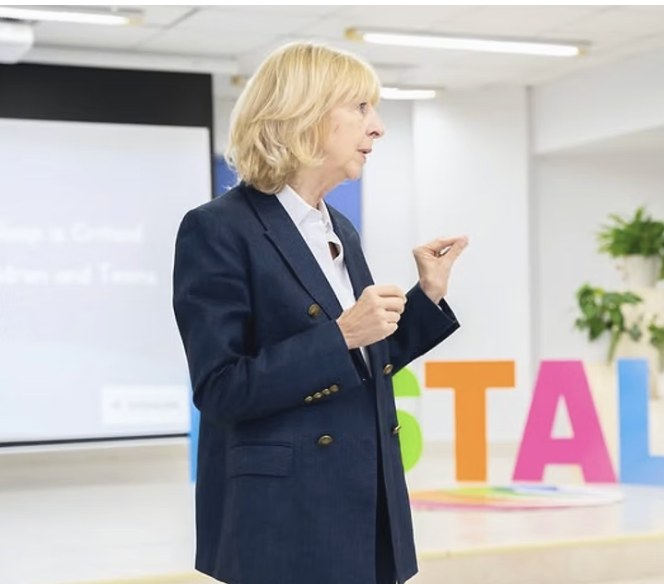 Julie Mallon delivering a corporate sleep and wellbeing talk