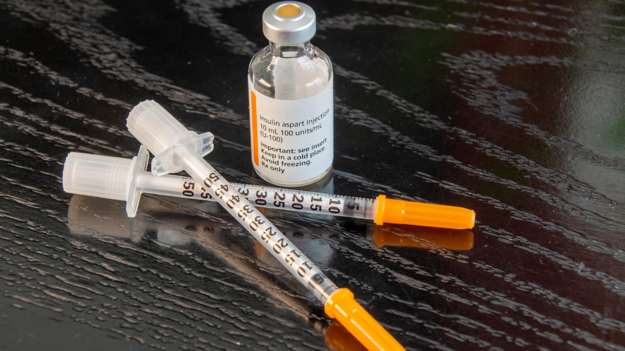 Insulin vials and syringes prepared for canine and feline diabetes management