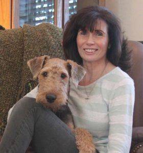 Dr. Fiona McCord, BVM&S, MS, JD, end-of-life and hospice care veterinarian, with her Airedale Terrier