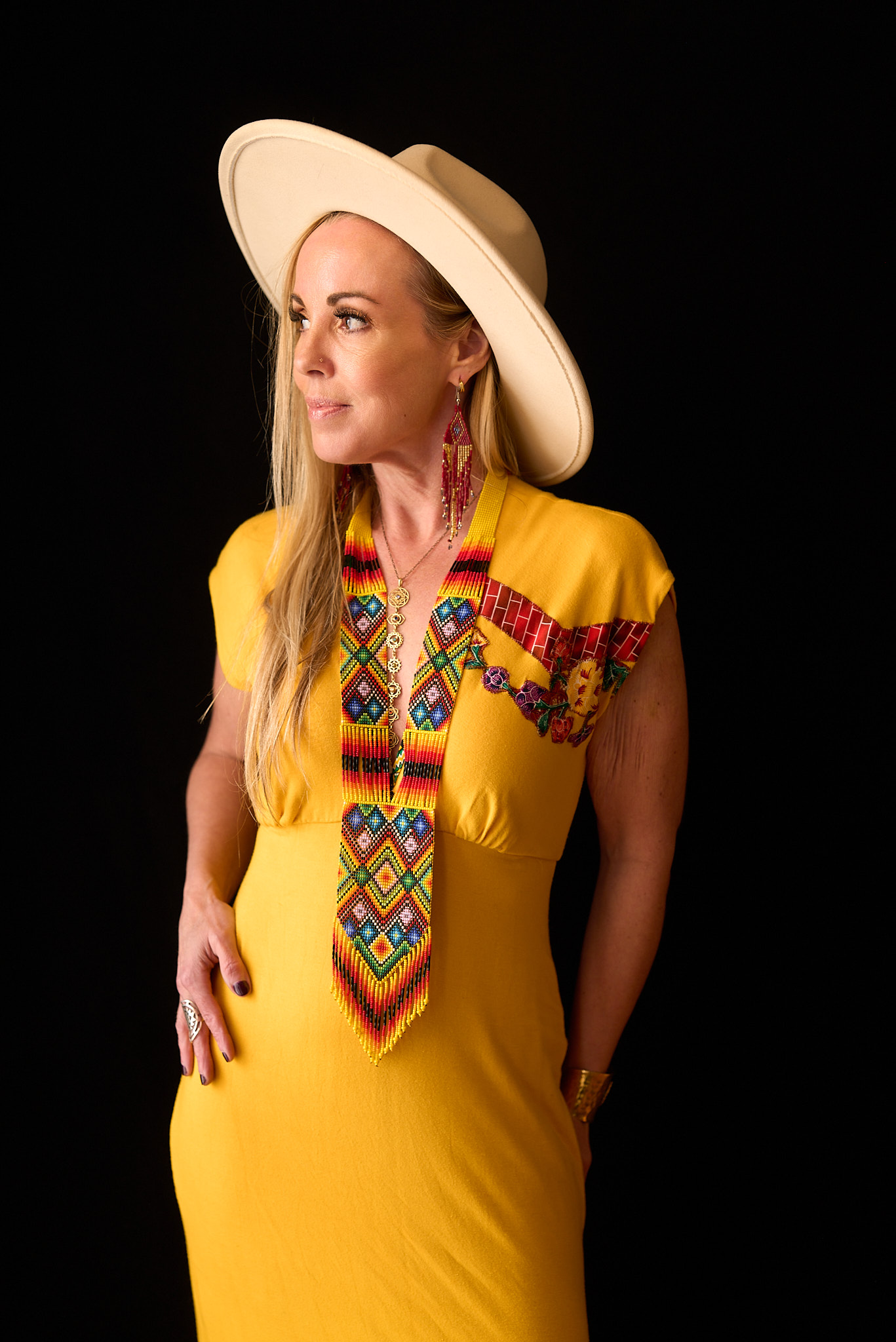 Woman sitting peacefully in warm light, representing the steady process of age stage healing