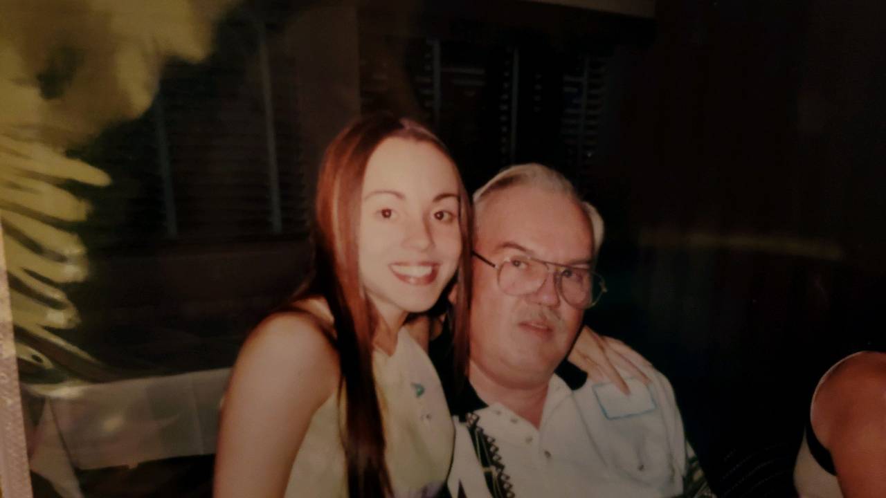 Dawn Light Amora as a young woman with her father